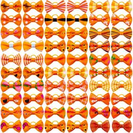 Vêtements de chien 50/100pcs arcs de cheveux d'animaux de compagnie orange pour petits accessoires automne/automne produits de toilettage