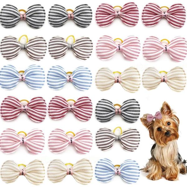 Vêtements de chien 50 / 100pcs Pet Hair Bow Chiens Chapeaux Stripe Style Bows Toilettage pour chats Produits