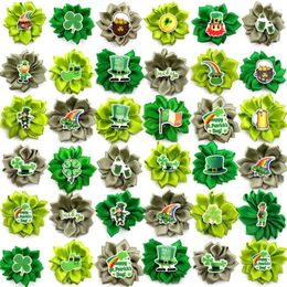 Vêtements pour chiens 50/100pcs ST Patrick's Day Petits nœuds de cheveux Bandes de caoutchouc Yorkshire Clover Accessoires de toilettage pour produits pour animaux de compagnie