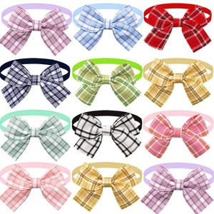 Ropa para perros 50pcs bowtie para perros pequeños lindos a cuadros mascotas gato corbata de pajarita mascotas accesorios de preparación suministros