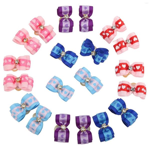 Vêtements de chien Cat Hair Bowknot facile à porter attrayant mignon fort arcs pour animaux de compagnie à la mode avec des bandes de caoutchouc pour la fête d'anniversaire de marche