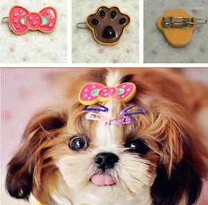 Vêtements de chien pour animaux de compagnie Clipper accessoires de camais peints de bonbons peints Fleurs de tête d'arc 30pcs / lot