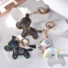 Llaveros con diseño de perro, soporte para llaveros de coche, llaveros de flores marrones a la moda, accesorios de joyería con bonito bolso, colgantes de animales de cuero PU de dibujos animados, regalos