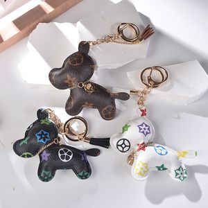 Design de conception de chien porte-clés de voiture porte-clés, chaînes de clés à fleurs bruns de mode, accessoires de bijoux à bijoux mignon de sac, dessin animé en cuir en cuir pendentif animal charmes cadeaux