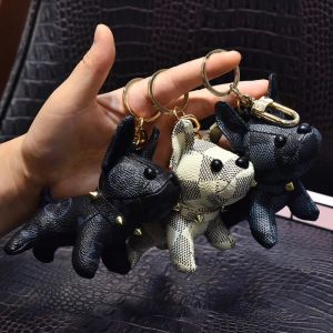 Porte-clés de chien avec boîte Designer Animal de bande dessinée Petits accessoires créatifs Porte-clés en cuir PU Lettre Modèle Voiture Porte-clés Bijoux Cadeaux Accessoires 6 couleurs