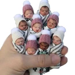 Poupées simulé bébé nouveau-né pvc poignée décorative jouet petit doigt de doigt réel vêtements aléatoire s2452202 s2452203