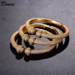 Donia – Bracelet de créateur de bijoux, double poing en cuivre avec bijoux en zircone, ouverture réglable, Bracelet de luxe, cadeau