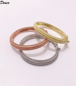 Donia bijoux bracelet de luxe mode européenne et américaine exagérée grand moulin à vent bracelet en cuivre perle cinq rangées personnalisé des5100776
