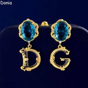 Donia bijoux boucles d'oreilles de luxe lettres de mode européennes et américaines titane micro-incrusté zircon créatif boucles d'oreilles de créateur boîte-cadeau.