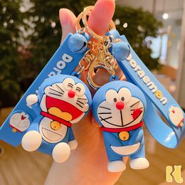 Porte-clés de dessin animé pour enfants Doraemon, accessoires d'animation créative, chat, Doraemon, pendentif portefeuille, cadeaux de couple