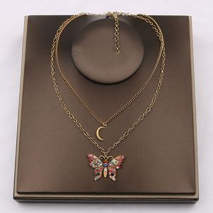 Colliers de pendentif à double lettre 18k 18k plaqués papillon crysatl collier de pull en strass de perle pour femmes accessoires de bijoux de mariage