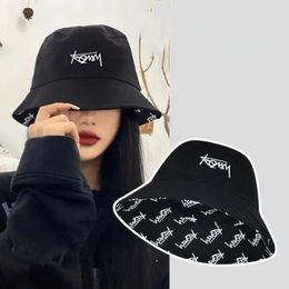 Hombre de cubo de desgaste de doble cara Hombres mujeres Carta de graffiti japonesa Sol al aire libre Hats unisex ancho ancho plegable pescador plegable 240415