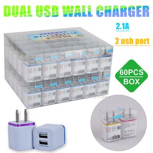 Cargador doméstico doble USB 2.1A Cargador de pared con dos puertos USB con marco colorido para todos los teléfonos móviles con caja de PVC y código de barras UPC