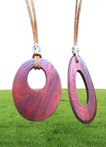 Dubbele houten cirkel hangers kettingen vintage lange trui ketting eenvoudige lederen snoer mannen vrouwen handgemaakte carving sieraden 15pcs5720522