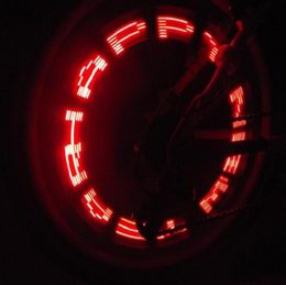 Rueda de bicicleta de doble cara Radios Luces LED Lámparas Neumático de ciclo Válvula de rueda 7 LED Luz de flash con letra súper brillante LDE C1811095936557