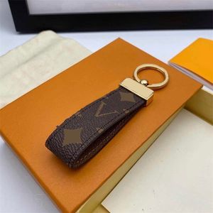 Dragonne -ontwerper Keychain voor heren Key Chains Classic Old Flower Pattern Letters Senior Handig Cowhide Leather Gold Gold Luxury Keyring Fashion PJ047 E23