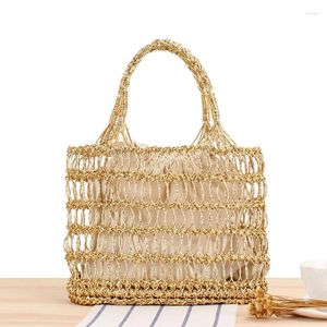 Drawstring 2024 Bohemia Goud- en zilveren draad holle hand Haaktas Tide Tide Girl Forest Vacation Beach draagbaar stro