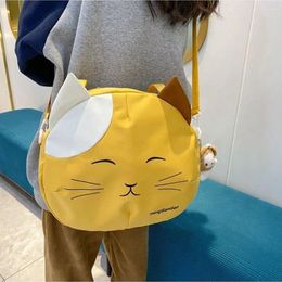 Cordon toile imprimés en nylon sac de messager chat mignon style collégial de grande capacité à bandoulière de sac à main portable streetwear