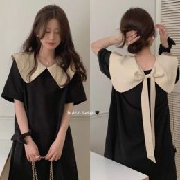 Jurk Anbenser 2023 zomer nieuwe Koreaanse versie ontwerp voor- en achterkant dubbele slijtage grote strik contrasterende kleur pop hals slanke zwarte jurk