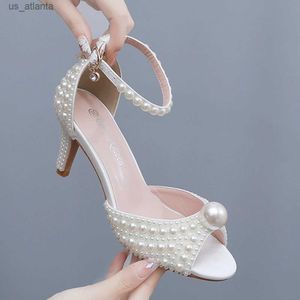 Chaussures habillées Crystal Queen Fashion Femmes Open Toe High Talons Lady Banquet de mariage de luxe Sandales de perles blanches STILETTO H240409