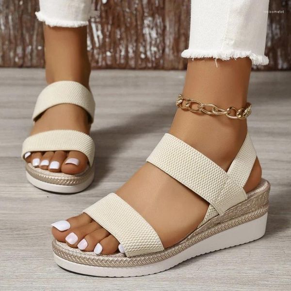 Sandalias de tacón de la pendiente gruesa tejida de los zapatos para mujeres Tisos elásticos de verano 2024 con un cinturón