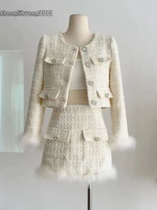 Kleed tweedelige herfst Winter Franse vintage 2 stuks Sets Tweed Jacket Korte jas Feather splicing Blazerhigh taille mini rokpak 231205 S 3105
