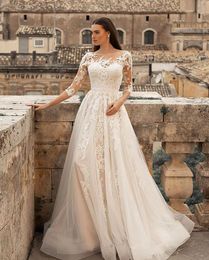 Jurk Vintage bruiloft ronde hals kanten mouwen bruidjurken tule applicaties sweeptrain boho vestidos de novia