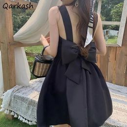 Robe femmes élégant rétro Simple noir solide femme robe d'été Style coréen fête vacances dos arc décoration Sexy dames loisirs 240126