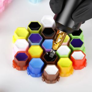 Jurken 200 PCS Tattoo Ink Cups Honeycomb Design Ink Cups Wegwerp Tattoo Ink Cups Permanente Make -up Pigment Clear Holder Container Cap