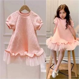 Robes 2023 Jupe décontractée rose pour enfants Robe de mode de marque de luxe pour filles Robe de princesse à manches courtes en fil net pour enfants