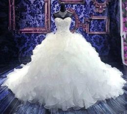 Jurken goedkoop lange treinbaljurk trouwjurken contant bij levering Vestido noiva sweetheart kralen Organza puffy jurk bruid