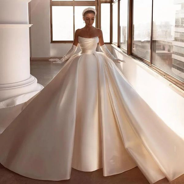 Vestidos Elegante vestido de novia vestido de novia 2023 Perlas sin tirantes Vestidos de novia modernos Tren de barrido Satén Árabe Dubai Gran arco Vestido de Novia