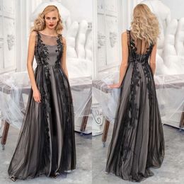 Robes Unique sans manches Bateau Prom sirène conception en tulle avec une fermeture de fleurs à la fermeture arrière sans fonte plus la taille de la robe de fête sur mesure Vestido de NOITE