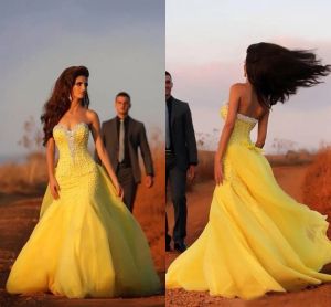 Jurken Yellow Mermaid Wedding Jurken 2015 Sweetheart pailletten Beads Watteau Sweep Train Organza Bridal Dress Ruffles Beach Cheap Wedding