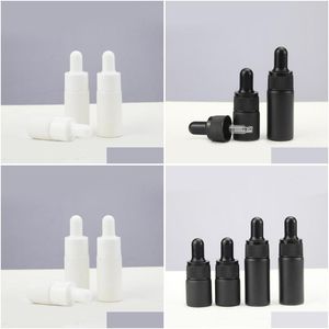 Botellas cuentagotas de lujo Mini 10Ml Mate Negro Blanco Aceite esencial Botella de pipeta de vidrio 5Ml Venta al por mayor Entrega de gota Oficina Escuela Busi Dhqr2