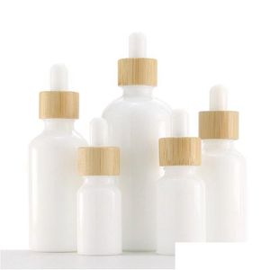 Druppelflessen Groothandel Wit porseleinen glazen flessen voor etherische olie Huidverzorging Serum Druppelflesje met bamboepipet 10 ml 15 ml 20 M Dhduj
