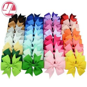 40 kleuren schattige boog barrettes kinderen haarclip effen kleur fishtail boog haarspeld mode haaraccessoires voor kinderen