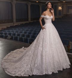 Dubaï arabe dentelle robe de bal robes de mariée 2023 hors épaule chérie dos nu balayage train robes de mariée Bling luxe perles paillettes robes de mariée robe de Noiva
