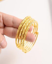 Dubaï Fine Gold Bangle Yellow Solid GF Bracelet Africa Bijoux Circle Circle 1pc ou 4 PC Élasticité ouverte Pushandpull Whole2700600