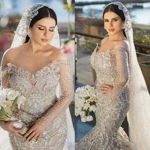 Vestido de novia de sirena de lujo de Dubai Apliques de encaje 3D Ilusión fuera del hombro Vestidos de novia de manga larga De Soiree Cuentas de alta costura turca por encargo