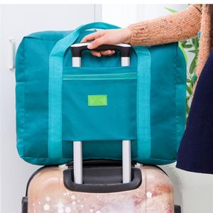 Plunjezakken 2023 Nylon opvouwbare reis unisex grote capaciteit tas bagage vrouwen waterdichte handtassen mannen