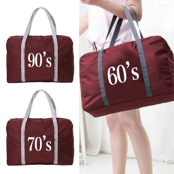 Sacs polochons 2023 Nylon pliable voyage femmes grande capacité sac bagages unisexe sacs à main imperméables années modèle hommes