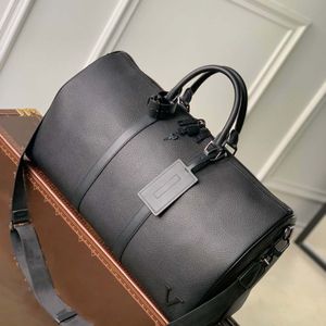 Sacs Duffel 50cm grande capacité vente de voyage femmes hommes véritable sac à bandoulière en cuir de mode bagage à main rivets inférieurs avec tête de verrouillage marque S462 004