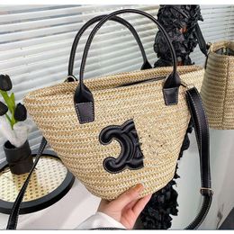 Bolsas de lona Bolsa de diseñador Moda de verano para mujer Bolsa de cesta de verduras tejida Bolsa de arco de playa Bolsa de cubo de paja Bolso de moda de lujo Bolsos de hombro