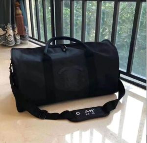 Sacs Duffel Haute qualité luxe mode hommes femmes voyage sacs de sport marque designer bagages sacs à main grande capacité sport Duffel sac 45 * 25-21 cm