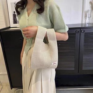 Duffel Bags Korea Style Mesh Hollow Dikke Gebreide handtas Vrouwen Spring Summer Cool veelzijdige polscapaciteitspolsas draagbaar