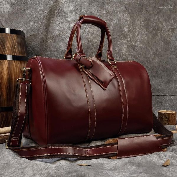 Bolsas de lona luufan bolso de viaje de cuero genuino hombre big fin de semana bolso de piel de cowskin equipaje manual de mano masculina