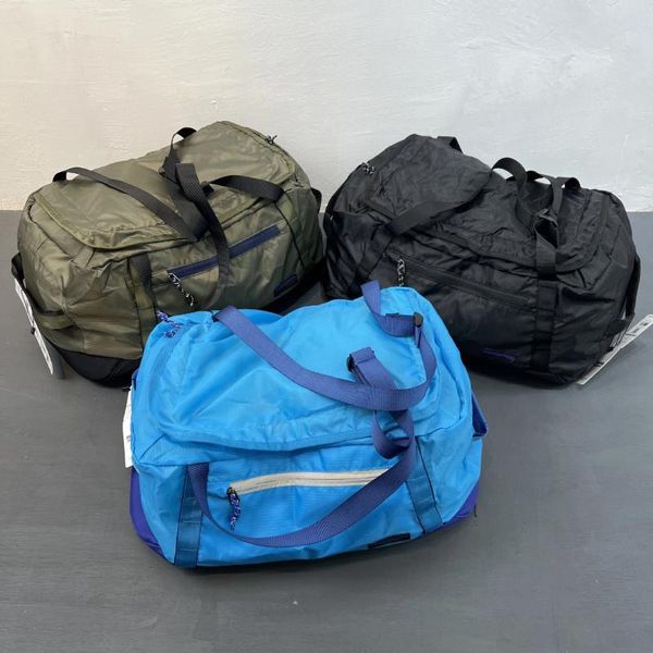 Sacs polochons Sac à bagages pliable en nylon pour hommes et femmes Sac à main de grande capacité Sports de plein air Fitness Sac à dos 30L