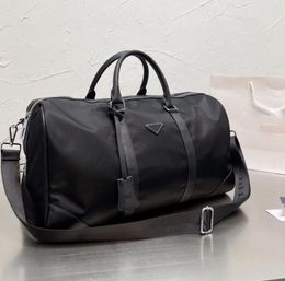 Sacs Duffel Top Quality Men Fashion Duffle Bag Triple Black Nylon Sacs de voyage Poignée pour hommes Bagages Gentleman Business Fourre-tout avec bandoulière Commentaires Rave