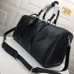 Bolsas de lona de calidad superior Cerradura original Bolsa de lona Hombres Mujeres Lujos Diseñadores Bolsas 2021 Water Ripple Deportes Bolsa de viaje Diseñadores Bolsos para mujer Monederos